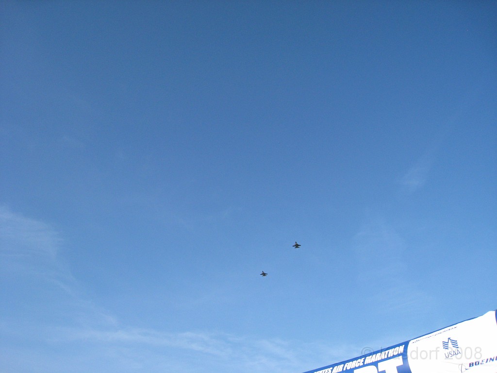 USAF Half Marathon 2009 180.jpg - A fly over to signal the start of the race! Followed by a loud cannon blast both scared quite a few people.